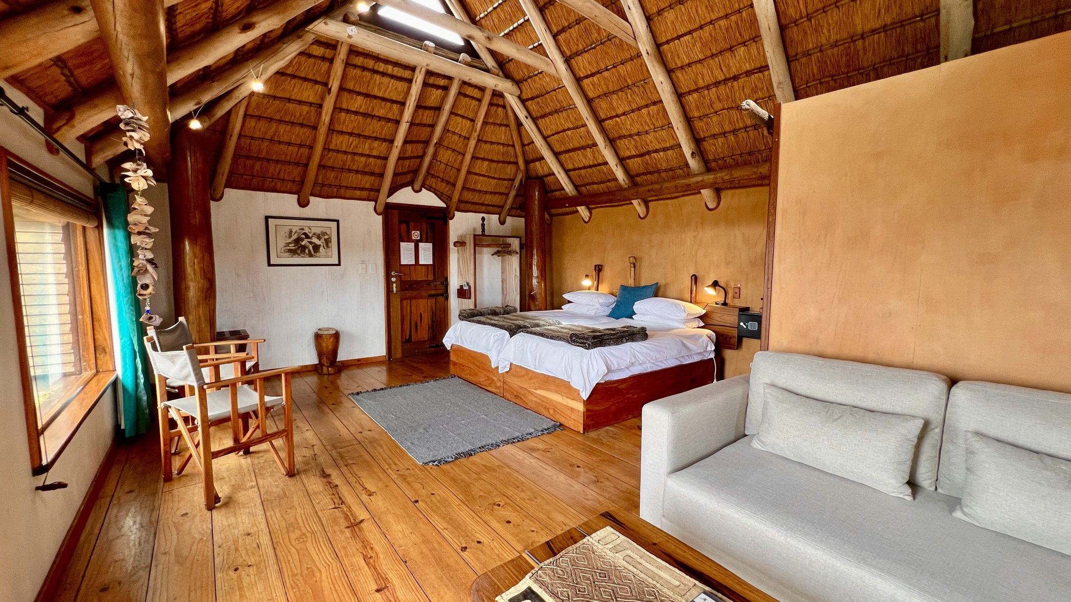 Family bungalow bedroom with dining and lounge space