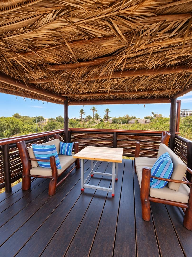 Sheltered Villa balcony with chairs and a table