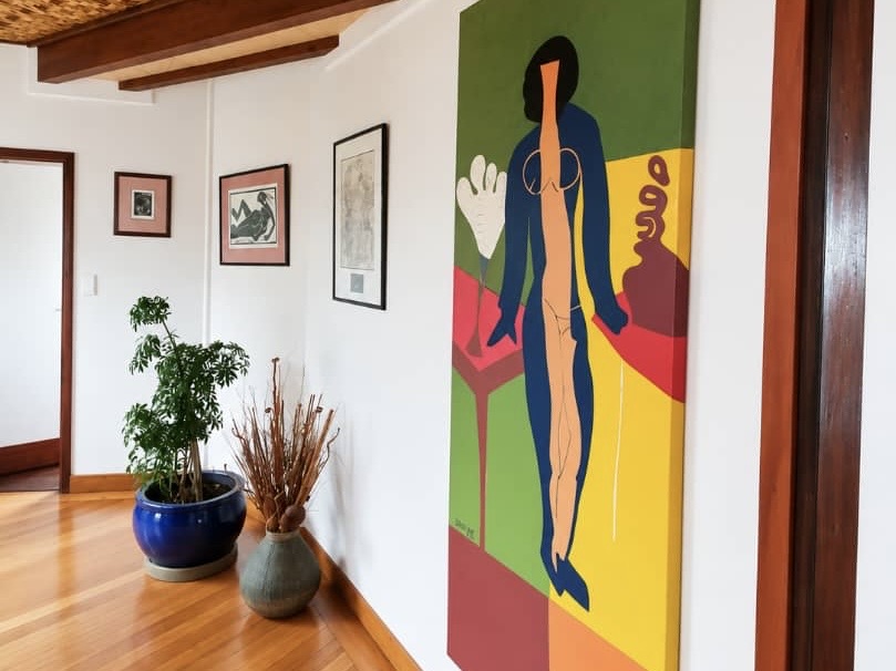 Colourful artwork and plants in a Villa interior